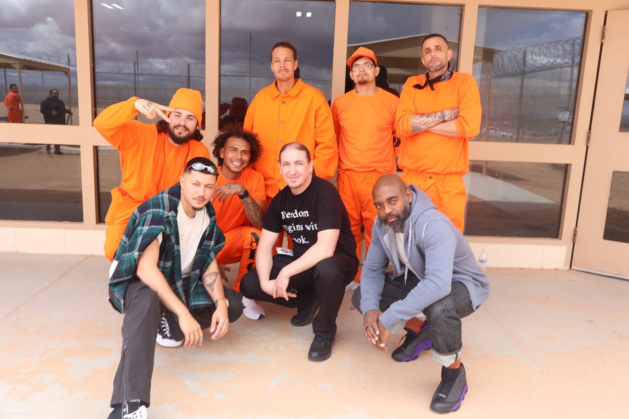 David (lower left), Freedom Reads Founder & CEO Reginald Dwayne Betts (lower right), and Freedom Reads Program Coordinator Steven Parkhurst (lower middle) with men at Arizona State Prison Complex - Yuma during the Inside Literary Prize tour. David (lower left), Freedom Reads Founder & CEO Reginald Dwayne Betts (lower right), and Freedom Reads Program Coordinator Steven Parkhurst (lower middle) with men at Arizona State Prison Complex - Yuma during the Inside Literary Prize tour.