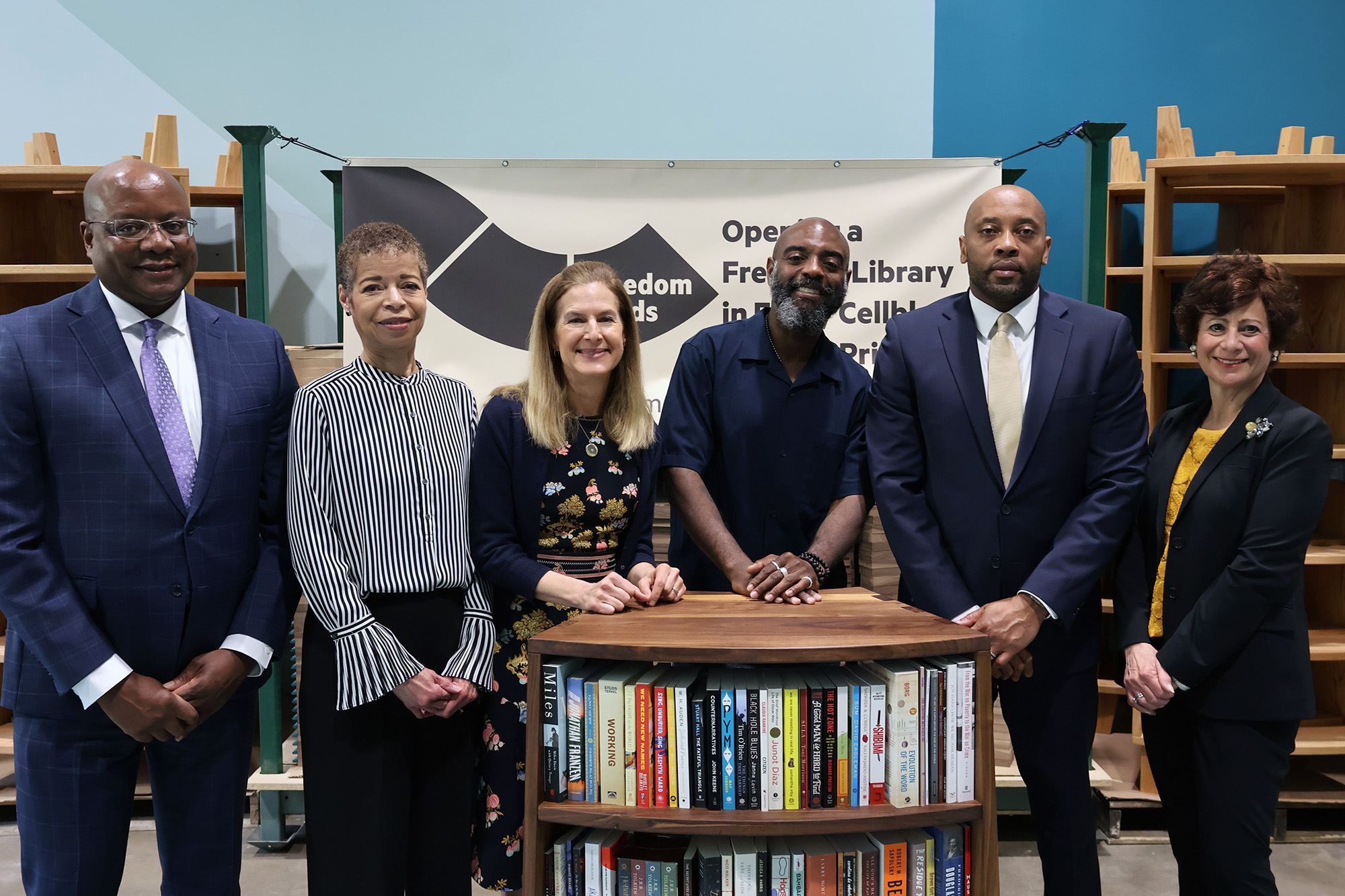 CHEFA and Freedom Reads hosted an official partnership launch event at Freedom Reads headquarters in Hamden, CT. From left to right: CHEFA Grant Committee Chair Lawrence Davis, CHEFA Executive Director Jeanette W. Weldon, Connecticut Lieutenant Governor Susan Bysiewicz, Freedom Reads Founder & CEO Reginald Dwayne Betts, Chief Diversity and Inclusion Officer for the Connecticut Office of Workforce Strategy Anthony Barrett, and CHEFA Manager of Grant Programs and Philanthropic Outreach Betty Sugerman Weintraub.