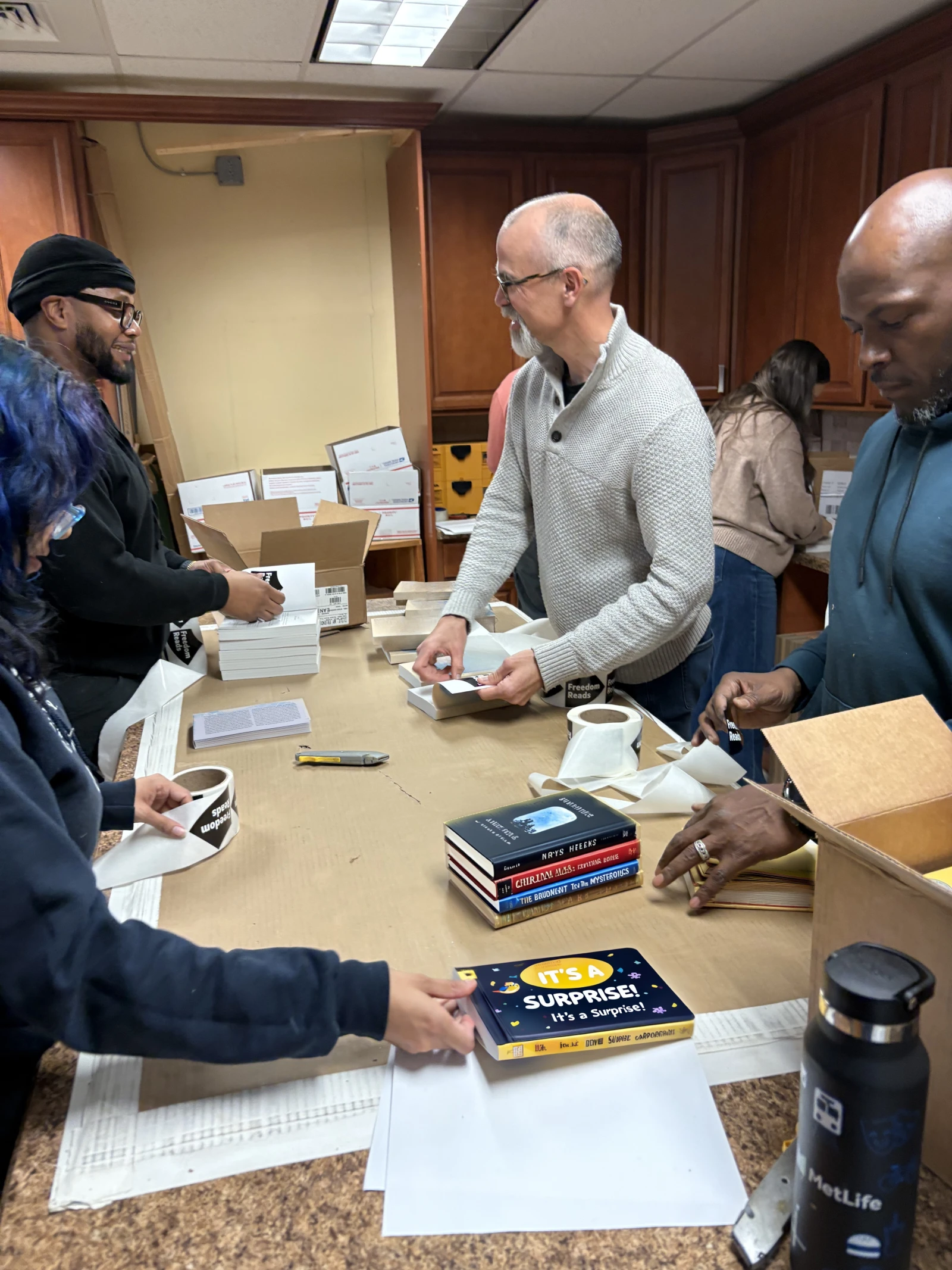 People packing books