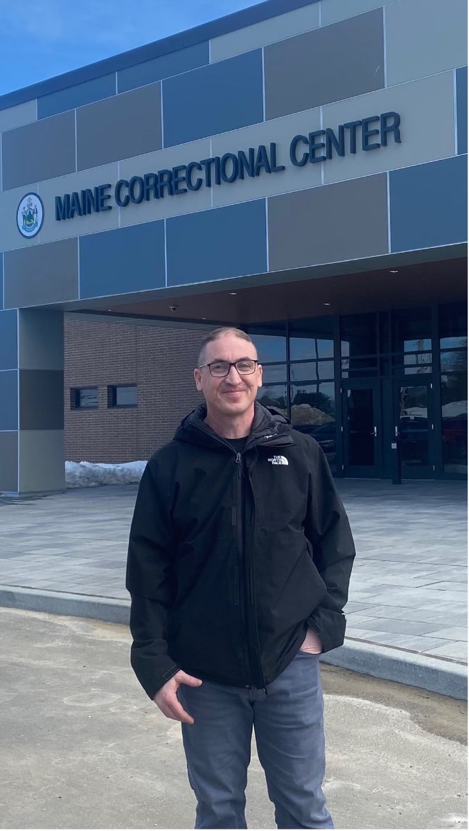 Freedom Reads Program Coordinator Steven Parkhurst leaving Maine Correction Center after opening Freedom Libraries there.